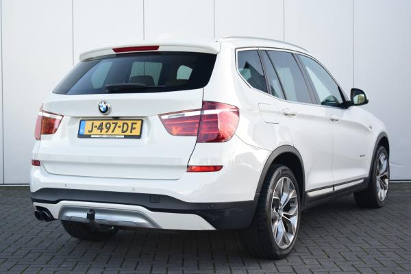 BMW X3 xDrive28i Centennial High Executive Leer/Verwarmd/Voor/Achter Navi/Camera Pano/Dak Trekhaak